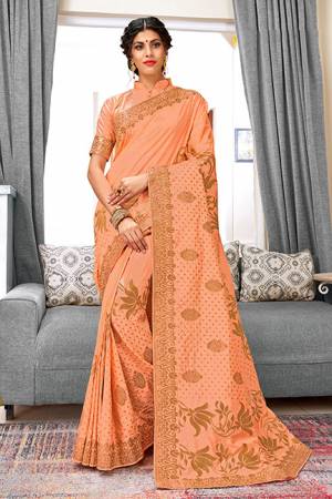 Flaunt Your Rich And Elegant Taste Wearing This Designer Saree In?Peach Color Paired With Peach Colored Blouse, This Saree And Blouse Are Weaving Art Silk Based Which Also Gives A Rich Look To Your Personality