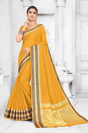 Grab This Pretty Elegant Looking Saree In Musturd Yellow Color. This Saree Is Fabricated On Soft Cotton Paired With Art Silk Fabricated Blouse. It Is Beautified With Checks Foil Print And Lace Border. Also It Is Light In Weight And Easy To Carry All Day Long. 