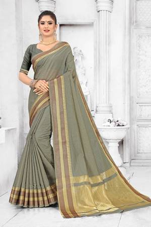 Grab This Pretty Elegant Looking Saree In Grey Color. This Saree Is Fabricated On Soft Cotton Paired With Art Silk Fabricated Blouse. It Is Beautified With Checks Foil Print And Lace Border. Also It Is Light In Weight And Easy To Carry All Day Long. 