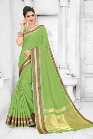 Grab This Pretty Elegant Looking Saree In Green Color. This Saree Is Fabricated On Soft Cotton Paired With Art Silk Fabricated Blouse. It Is Beautified With Checks Foil Print And Lace Border. Also It Is Light In Weight And Easy To Carry All Day Long. 