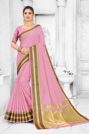Grab This Pretty Elegant Looking Saree In Pink Color. This Saree Is Fabricated On Soft Cotton Paired With Art Silk Fabricated Blouse. It Is Beautified With Checks Foil Print And Lace Border. Also It Is Light In Weight And Easy To Carry All Day Long. 