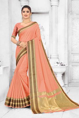 Grab This Pretty Elegant Looking Saree In Peach Color. This Saree Is Fabricated On Soft Cotton Paired With Art Silk Fabricated Blouse. It Is Beautified With Checks Foil Print And Lace Border. Also It Is Light In Weight And Easy To Carry All Day Long. 