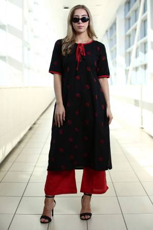 Simple And Elegant Kurta Set Is Here In Black Colored Kurti Paired With Red Colored Plazzo. This Kurti Is Fabricated On Organic Cotton Paired With Khadi Fabricated Bottom. Buy This Readymade Pair Now.