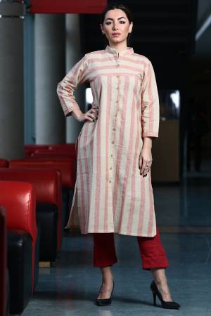 Grab This Readymade Lining Printed Kurti In White And Pink Color Fabricated On Organic Cotton Paired With Red Colored Khadi Fabricated Bottom. Both Its Fabric Are Light Weight And Easy To Carry All Day Long. 