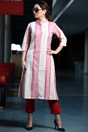 Grab This Readymade Lining Printed Kurti In White And Pink Color Fabricated On Organic Cotton Paired With Red Colored Khadi Fabricated Bottom. Both Its Fabric Are Light Weight And Easy To Carry All Day Long. 