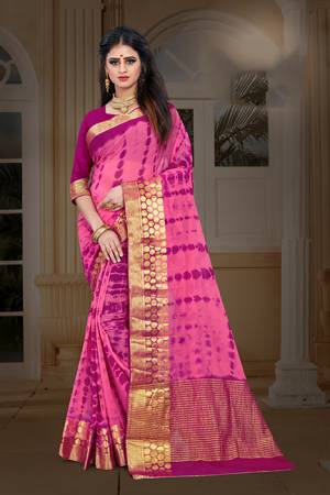 New And Unique Patterned Bandhani Printed Designer Saree In Pink color Paired With Dark Pink colored Blouse. This Saree Is Fabricated On Chiffon Paired With Art Silk Fabricated Blouse. It Is Light In Weight And Easy To Carry All Day Long. 