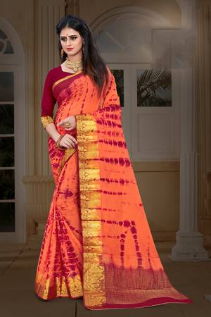 New And Unique Patterned Bandhani Printed Designer Saree In Dark Peach color Paired With Maroon colored Blouse. This Saree Is Fabricated On Chiffon Paired With Art Silk Fabricated Blouse. It Is Light In Weight And Easy To Carry All Day Long. 