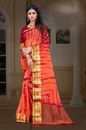 New And Unique Patterned Bandhani Printed Designer Saree In Dark Peach color Paired With Maroon colored Blouse. This Saree Is Fabricated On Chiffon Paired With Art Silk Fabricated Blouse. It Is Light In Weight And Easy To Carry All Day Long. 
