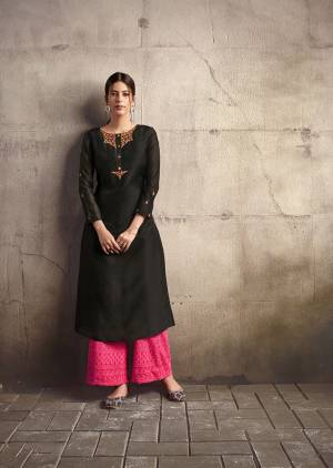 For A Bold And Beautiful Look, Grab This Designer Readymade Kurti In Black Color Paired With Dark Pink Colored Readymade Plazzo. This Pretty Kurti Is Silk Based Paired With Cotton Fabricated Bottom. 