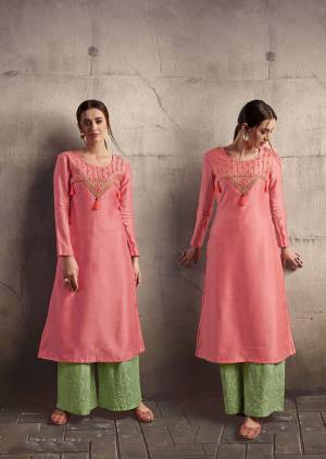 Look Pretty In This Lovely Readymade Pair Of Kurti And Plazzo In Pretty Color Pallete. Its Kurti Is In Pink Color Paired With Contrasting Light Green Colored Bottom. Its Kurti Is Silk based Paired With Cotton Bottom. Both The Top And Bottom Are Beautified With Thread Embroidery. 