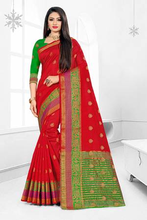 Celebrate This Festive Season With Ease And Comfort Wearing This?Royal Looking Silk Based Saree In Red Color Paired With Green Colored Blouse. This Saree Is Cotton Silk Based Paired With Art Silk Fabricated Blouse. Buy Now.