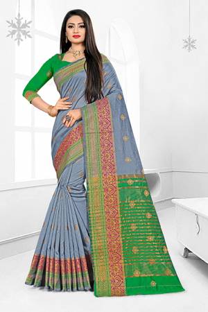 Celebrate This Festive Season With Ease And Comfort Wearing This?Royal Looking Silk Based Saree In Grey Color Paired With Green Colored Blouse. This Saree Is Cotton Silk Based Paired With Art Silk Fabricated Blouse. Buy Now.