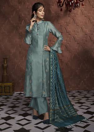 Flaunt Your Rich And Elegant Taste Wearing This Designer Readymade Suit In Steel Blue Color Paired With Teal Blue Colored Dupatta. This Pretty Readymade Top And Plazzo Are Soft Silk Based Paired With Banarasi Silk Dupatta. 