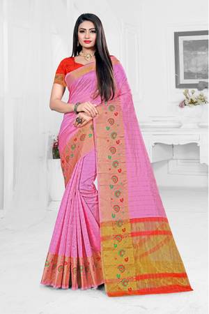 Grab This Very Beautiful Designer Saree With A Royal Silk Touch In Pink Color Paired With Red Colored Blouse. This Saree Is Fabricated On Orgenza Silk Paired With Art Silk Fabricated Blouse. It Has Very Elegant Heavy Weaved Border.