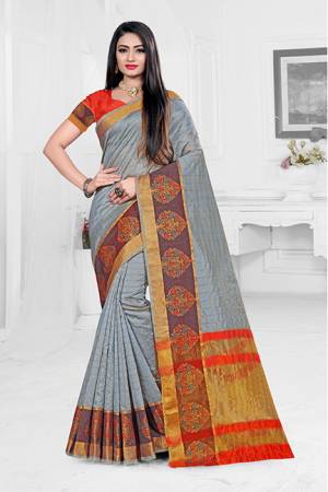Celebrate This Festive Season With Ease And Comfort Wearing This?Royal Looking Silk Based Saree In Grey Color Paired With Red Colored Blouse. This Saree Is Orgenza Silk Based Paired With Art Silk Fabricated Blouse. Buy Now.