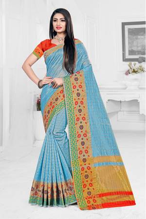 Celebrate This Festive Season With Ease And Comfort Wearing This?Royal Looking Silk Based Saree In Sky Blue Color Paired With Orange Colored Blouse. This Saree Is Orgenza Silk Based Paired With Art Silk Fabricated Blouse. Buy Now.