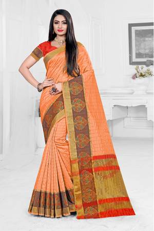 Grab This Very Beautiful Designer Saree With A Royal Silk Touch In Orange Color Paired With Red Colored Blouse. This Saree Is Fabricated On Orgenza Silk Paired With Art Silk Fabricated Blouse. It Has Very Elegant Heavy Weaved Border.