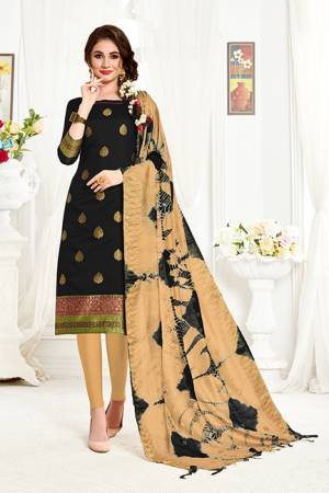 If Those Readymade Suit Does Not Lend You The Desired Comfort Than Grab This Dress Material In Black Colored Top Paired With Beige Colored Bottom And Dupatta And Get This Stitched As Per Your Desired Fit And Comfort. Its Top And Dupatta Are Fabricated On Banarasi Art Silk Paired With Cotton Fabricated Bottom. 