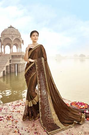 For A Bold And Beautiful Look, Grab This Fancy Designer Saree In Brown Color Paired With Brown Colored Blouse, This Saree Is Fabricated On Lycra And Net Paired With Art Silk Fabricated Blouse. This Saree IS Light Weight And Easy To Drape. Buy Now.