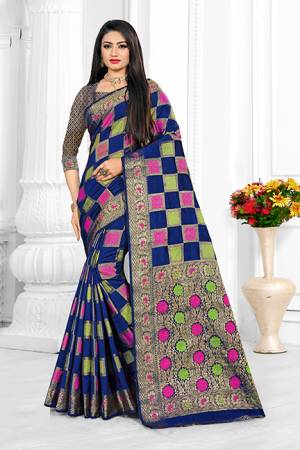 Here Is A Beautiful Designer Silk Based Saree In Royal Blue Color. This Pretty Checks Patterned Saree Is Fabricated On Cotton Silk Paired With Art Silk Fabricated Blouse. Buy This Saree Now.