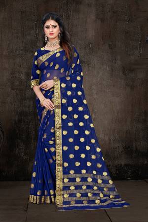 Here Is A Pretty Weaved Saree In Navy Blue Color. This?Saree Is Fabricated On Chiffon Paired With Art Silk Fabricated Blouse. It Is Beautified With Attractive Weave All Over. Also It Is Light In Weight And Easy To Carry All Day Long. 