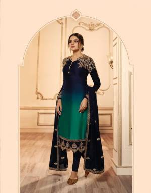 Very Beautiful Shaded Indo-Western Suit Is Here In Navy Blue And Teal Green color. Its Beautiful Top IS Fabricated On Georgette Satin Paired With santoon Bottom, Georgette Fabricated Lehenga And Dupatta.Buy This Designer Two In One Suit Now.