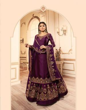 Here Is A Beautiful Heavy Designer Indo-Western Suit In Purple Color. This Pretty Suit Comes With Two Bottoms So That You can Pair As Per The Occasion. It Top IS Fabricated On Georgette Satin Paired With Santoon Bottom And Georgette Fabricated Lehenga And Dupatta. Buy Now.