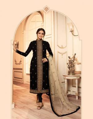 Very Beautiful Shaded Indo-Western Suit Is Here In Black And Cream color. Its Beautiful Top IS Fabricated On Georgette Satin Paired With santoon Bottom, Net Fabricated Lehenga And Dupatta.Buy This Designer Two In One Suit Now.