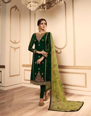 Pretty Shades Of Green Are Here With This Designer Heavy Indo-Western Suit In Dark Green And Light Green Color. Its Top IS Fabricated On Satin Georgette Paired With Two Bottoms, One In Santoon And Another In Net Fabricated Lehenga And Net Dupatta. All Its Fabric Are Durable, Light Weight And Easy To Carry All Day Long. 