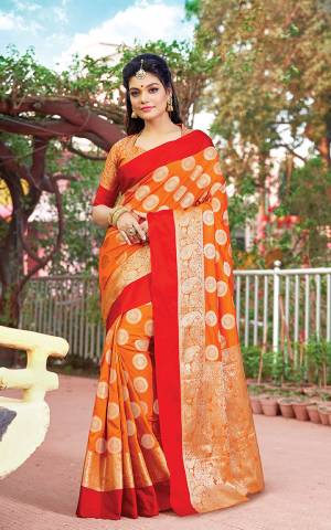 Celebrate This Festive Season Wearing This Designer Saree In Orange Color. This Saree Is Fabricated On Art Silk Paired With Jacquard Silk Fabricated Blouse Beautified With Weave.