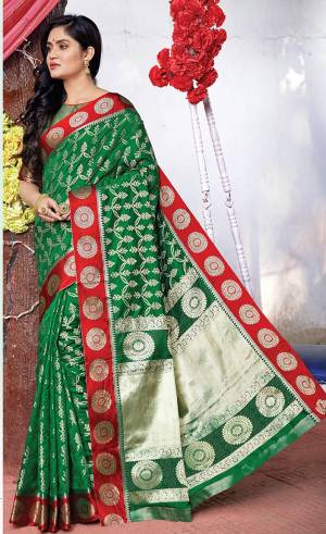Grab This Very Pretty Designer Saree In Green Color Suitable For Any Occasion Or Festive Wear. This Saree Is Silk Based Paired With Jacquard Silk Fabricated Blouse.