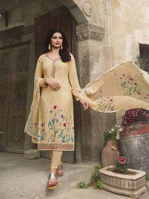 Here Is A Very Beautiful Designer Straight Suit In Cream Color. This Pretty Top Is Fabricated On Crepe Paired With Santoon Fabricated Bottom And Chiffon Fabricated Dupatta. It Is Beautified With Floral Printed And Embroidery. Buy Now.