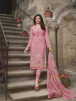 Look Pretty In This Designer Straight Suit In Pretty Pink Color. This Semi-Stitched Suit Is Fabricated On Crepe Paired With Santoon Bottom And Chiffon Fabricated Dupatta. It Has Pretty Floral Prints And Subtle Embroidery. 