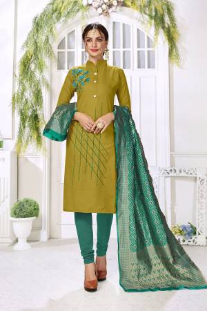 Celebrate This Festive Season With Beauty And Comfort Wearing This Designer Straight Suit In Olive Green Color Paired With Contrasting Navy Blue Colored Bottom And Dupatta. This Dress Material Is Cotton based Paired With Jacquard Silk Fabricated Dupatta. Buy Now.