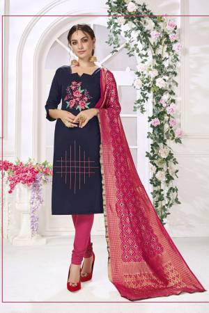 Here Is Very beautiful Dress Material In Navy Blue Color Paired?With Dark Pink Colored Bottom and Dupatta. Its Top And Bottom are Cotton based Paired With Jacquard Silk Fabricated Dupatta. Get This Stitched As Per Your Desired Fit And Comfort.