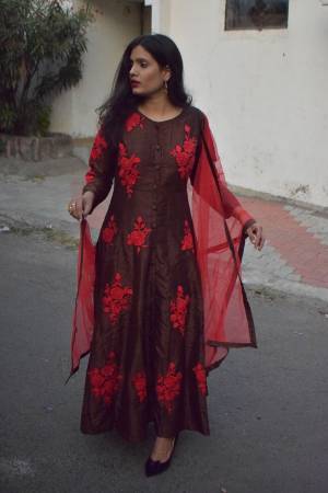 Enhance Your Personality Wearing This Readymade Floor Length Suit In Brown Color Paired With Red Colored Dupatta. This Suit Is Fabricated on Art Silk Paired With Santoon Bottom And Net Fabricated Dupatta. It IS Beautified With Contrasting Thread Work. 