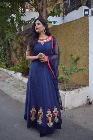 Grab This Designer Floor Length Readymade Suit In Navy Blue Color Paired With Grey Colored Dupatta. Its Embroidered Top Is Fabricated On Art Silk Paired With Santoon Bottom And Net Fabricated Embroidered Dupatta. 