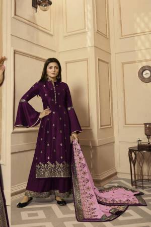 Get Ready For The Upcoming Festive And Wedding Season With This Very Beautiful Designer Straight Suit In Wine Color Paired With Lilac Colored Dupatta. Its Embroidered Top Is Satin Georgette Based Paired With Santoon Bottom And Net Fabricated Heavy Embroidered Dupatta. Buy This Lovely Suit Now.