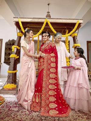 Here Is Beautiful Collection In Bridal Sarees With This Designer?Saree In Red Color Paired With Red Colored Blouse. This Saree And Blouse are Fabricated On Georgette Beautified With Heavy Jari And Resham Embroidery With Stone Work. This Beautiful Heavy Saree Will A Proper Bridal Look And Will Earn You Lots Of Compliments From Onlookers