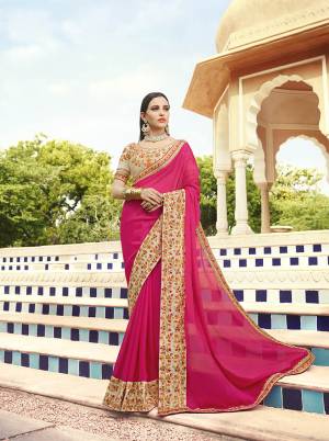 Shine Bright Wearing This Attractive Designer Saree In Rani Pink Color Paired With Cream Colored Blouse. This Saree Is Fabricated On Georgette Paired With Art Silk Fabricated Blouse. Its Blouse And Saree Border Are Beautified With Embroidery Giving An Attractive Look. 
