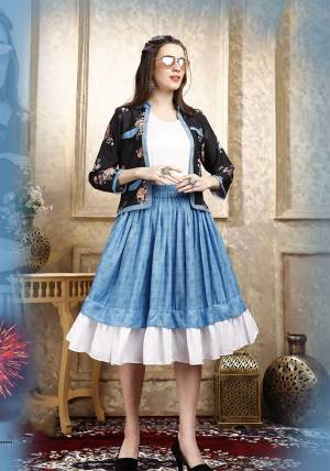 Here Is A Pretty Three Piece Western Set In White Colored Top Paired With Blue Colored Skirt And Black Colored Printed Jacket. Its Top Is Fabricated on Cotton Lycra Paired With Rayon Fabricated Skirt and Jacket. 