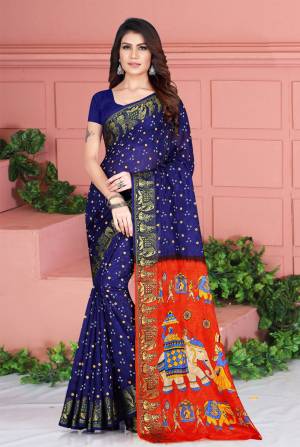 Celebrate This Festive Season Wearing This Pretty Saree In Navy Blue Color. This Saree And Blouse Are Silk Based Beautified With Prints. Also It Is Light In Weight Which Is Perfect For Festive Wear. Buy Now.