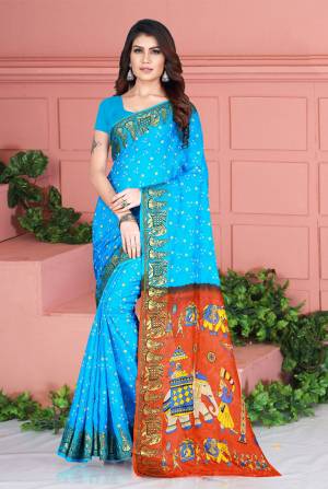 Celebrate This Festive Season Wearing This Pretty Saree In Blue Color. This Saree And Blouse Are Silk Based Beautified With Prints. Also It Is Light In Weight Which Is Perfect For Festive Wear. Buy Now.
