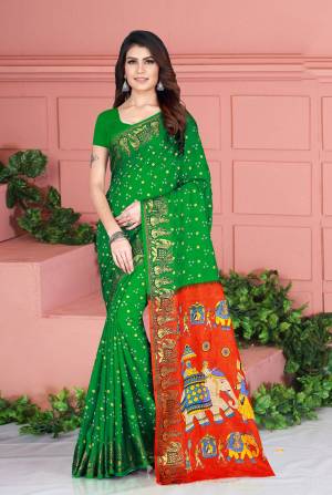 Celebrate This Festive Season Wearing This Pretty Saree In Green Color. This Saree And Blouse Are Silk Based Beautified With Prints. Also It Is Light In Weight Which Is Perfect For Festive Wear. Buy Now.
