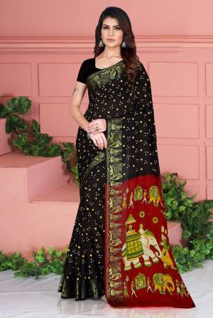Celebrate This Festive Season Wearing This Pretty Saree In  Black Color. This Saree And Blouse Are Silk Based Beautified With Prints. Also It Is Light In Weight Which Is Perfect For Festive Wear. Buy Now.