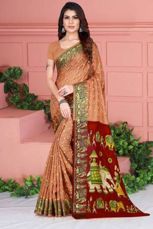 Celebrate This Festive Season Wearing This Pretty Saree In Beige Color. This Saree And Blouse Are Silk Based Beautified With Prints. Also It Is Light In Weight Which Is Perfect For Festive Wear. Buy Now.