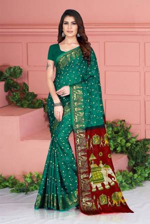 Celebrate This Festive Season Wearing This Pretty Saree In Teal Green Color. This Saree And Blouse Are Silk Based Beautified With Prints. Also It Is Light In Weight Which Is Perfect For Festive Wear. Buy Now.