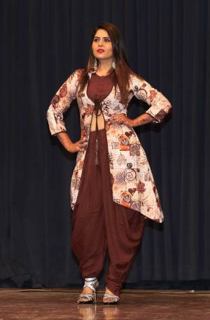 Add This Designer Readymade Indo-Western Set You Wardrobe In Brown Color. This Set Contains Is Blouse And Dhoti Paired With A Lovely Printed Jacket. This Pretty Dress Is Fabricated On Rayon Which Is Soft Towards Skin And Easy To Carry All Day Long. 