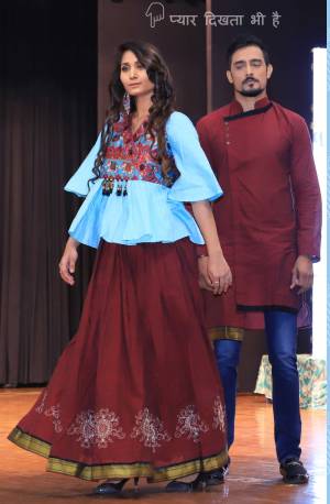 Grab This Special Combo Of Men And Women In Maroon And Sky Blue Color Which Is Fully Stitched And Available In All Regular Sizes. In This Combo You will Be Getting A Lehenga & Choli With Matching Men's Wear Kurta. All Three Pieces Are Fabricated On Khadi Cotton Which Is Light Weight, Durable And Easy To Carry Throughout The Gala. Buy Now.