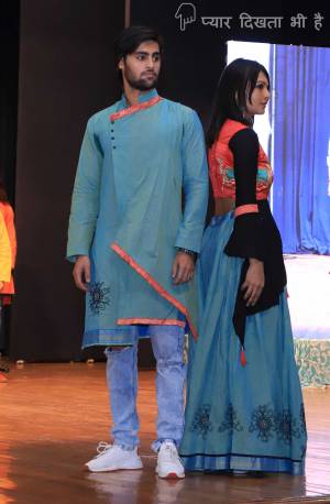 Grab This Special Combo Of Men And Women In Blue And Orange Color Which Is Fully Stitched And Available In All Regular Sizes. In This Combo You will Be Getting A Lehenga & Choli With Matching Men's Wear Kurta. All Three Pieces Are Fabricated On Khadi Cotton Which Is Light Weight, Durable And Easy To Carry Throughout The Gala. Buy Now.